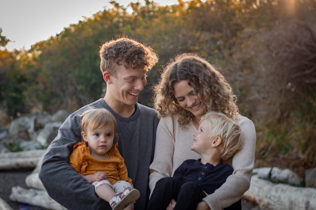 loving laughing children with parents beach family photoshoot victoria bc photography