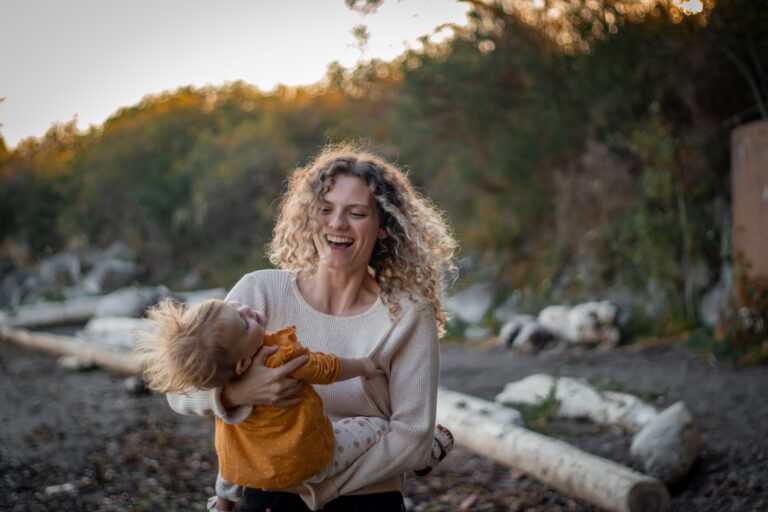 mom spinning baby beach family photoshoot victoria bc photography