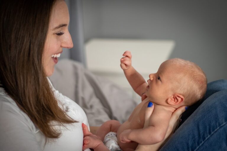 lifestyle in-home newborn session mom and baby playing alyssa orrego photography