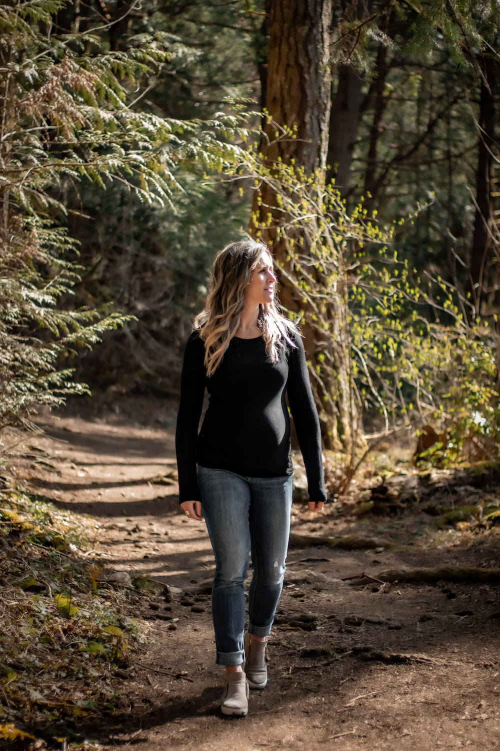 pregnant mama exploring in the forest maternity session horth hill regional park victoria bc