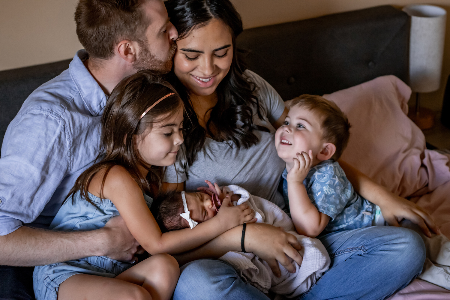 family cuddling for in-home newborn family session alyssa orrego photography victoria bc